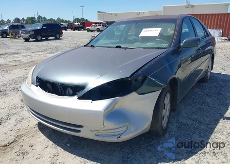 2002 Toyota Camry Le z USA, uszkodzony, nr VIN 4T1BE32K02U587544